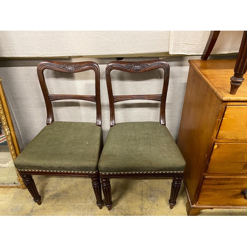 10 - A set of eight early Victorian mahogany dining chairs on turned fluted legs