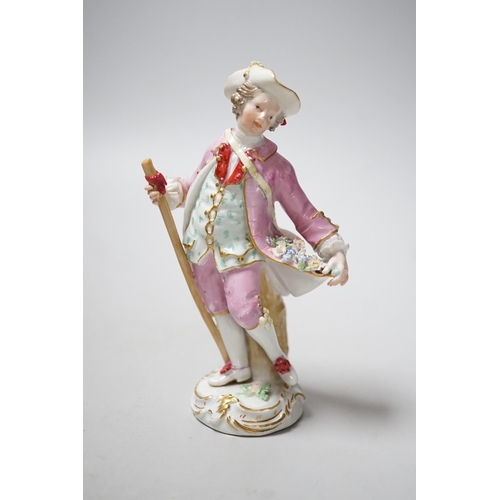 448 - A Meissen figure of a young man with walking stick and his tail full of flowers, late 18th century, ... 