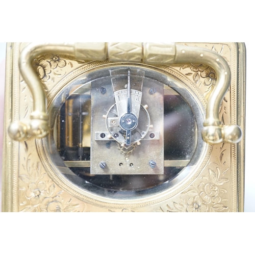 450 - A 19th century engraved brass carriage clock by A Margaine, 14cm