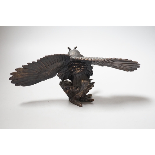 454 - Paul Eaton - a limited edition bronze owl, signed and dated 91. Numbered 013, wingspan 24.5cm... 