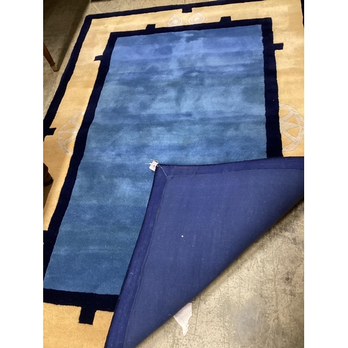 47 - A contemporary Chinese style blue ground rug, 180 x 124cm