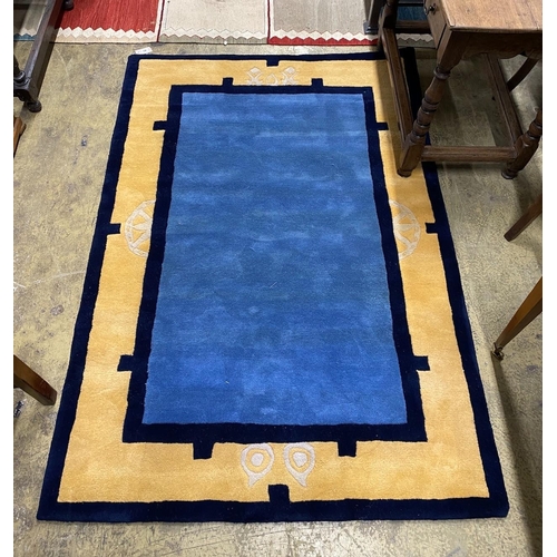 47 - A contemporary Chinese style blue ground rug, 180 x 124cm