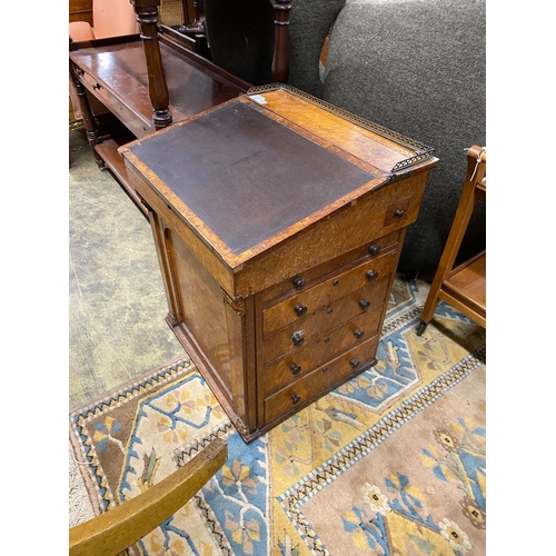 56 - A Regency bird's eye maple veneered davenport (in need of restoration), width 61cm, depth 55cm, heig... 