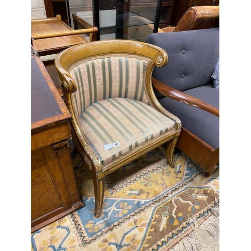 58 - A Regency painted, parcel gilt upholstered side chair with scroll back and acanthus mounts over swep... 