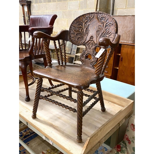 98 - A 19th century Continental carved oak tub framed elbow chair on turned spiral underframe, width 65cm... 