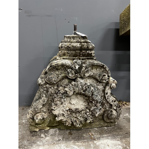 1002 - A carved stone corbel, width 60cm, height 60cm