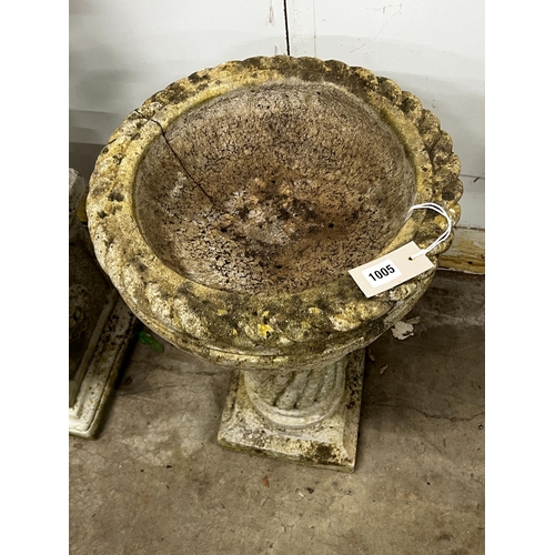 1005 - A circular reconstituted bird bath, diameter 40cm, height 65cm