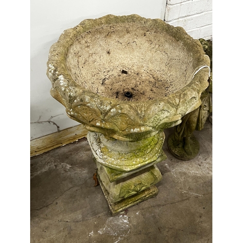 1007 - A reconstituted stone circular garden planter on square plinth, diameter 52cm, height 89cm