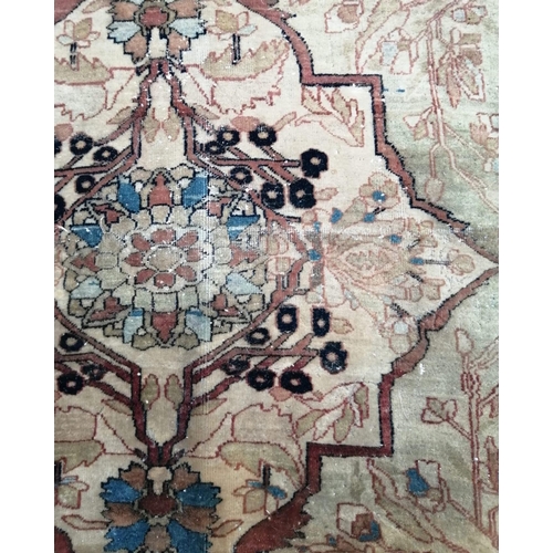 1048 - A fine Persian cream ground carpet, in distressed condition, 360 x 300cm