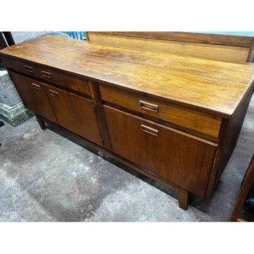 1071 - A mid century Novocraft teak dining suite comprising extending dining table 230cm extended, width 97... 