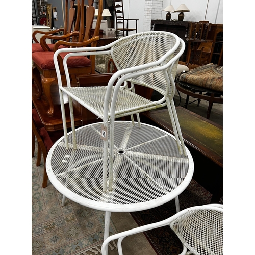 1081 - A circular painted aluminium garden table, diameter 100cm, height 72cm together with four matching s... 