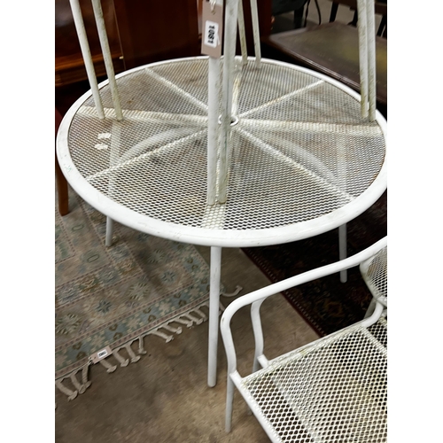 1081 - A circular painted aluminium garden table, diameter 100cm, height 72cm together with four matching s... 