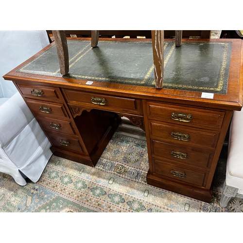 1089 - A late Victorian mahogany kneehole writing desk, width 122cm, depth 55cm, height 75cm together with ... 