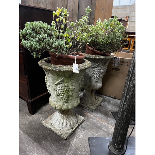 1097 - A pair of reconstituted stone circular garden planters, diameter 36cm, height 60cm