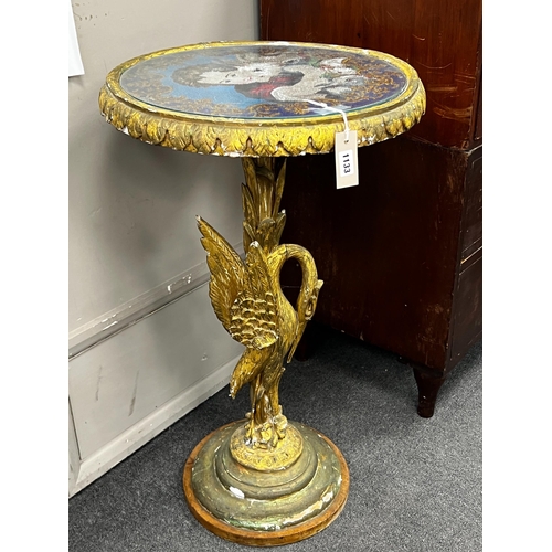 1133 - A Victorian giltwood and composition circular centre table with polychrome beadwork top on a carved ... 