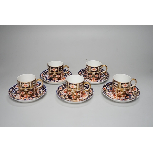 1253 - Five Royal Crown Derby Imari coffee cans and saucers