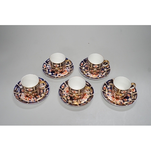 1253 - Five Royal Crown Derby Imari coffee cans and saucers