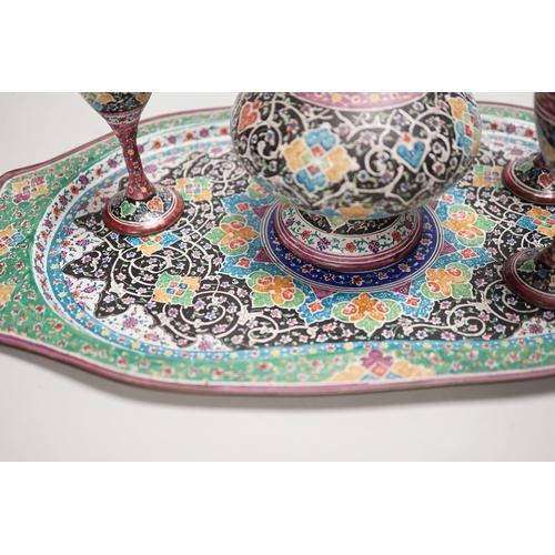 1257 - A decorative Persian enamel on copper set on stand. Tallest piece 20cm