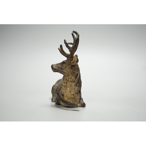 1259 - A Viennese cold-painted bronze model of a deer. 11cm wide