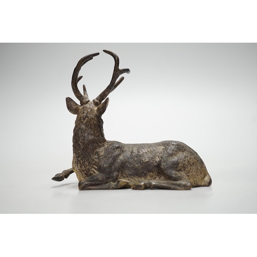 1259 - A Viennese cold-painted bronze model of a deer. 11cm wide