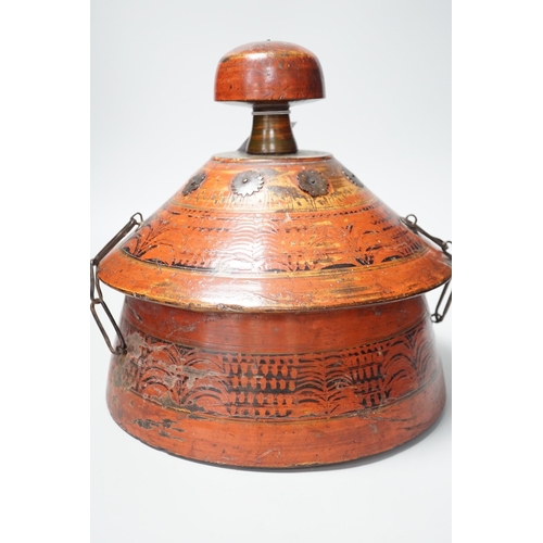 1282 - A Chinese wooden painted spice container and cover. 28cm tall