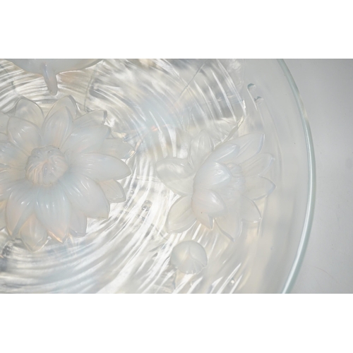 1284 - A Verlys opalescent glass dish with flower decoration. 35cm diameter