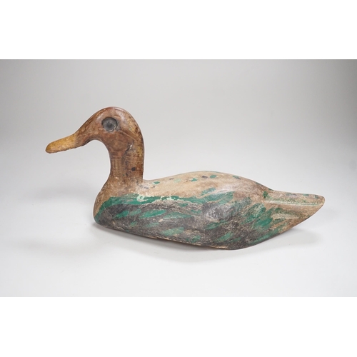 1296 - A 19th century painted decoy duck. 31cm long