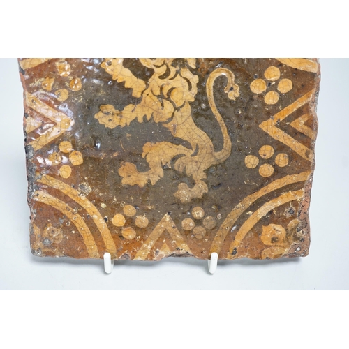 1300 - A single early ecclesiastical floor tile with rampant lion detail. 14 x 14cm