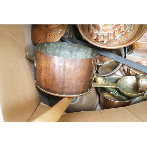 1310 - A quantity of various copper and brass to include jelly moulds, trivets, watering cans etc.