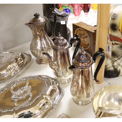 1315 - A large quantity of plated wares including two entree dishes and covers, a three-piece tea set etc.... 