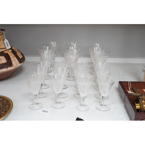 1317 - A part suite of Edwardian vineous etched glasses. Tallest 15cm