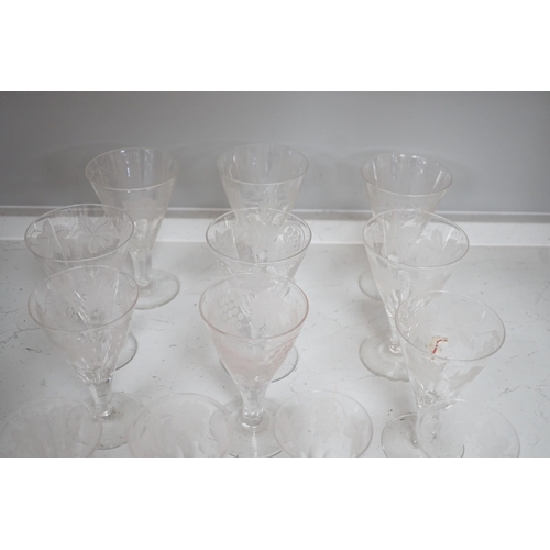 1317 - A part suite of Edwardian vineous etched glasses. Tallest 15cm