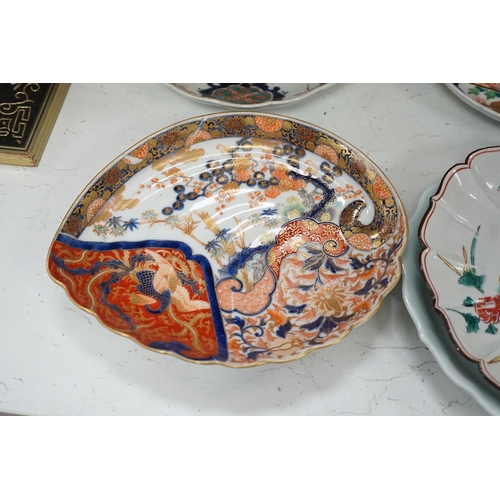 1320 - A group of 19th/20th century Japanese porcelain and pottery dishes. Largest 33cm diameter