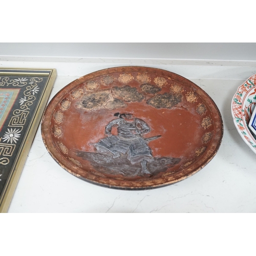 1320 - A group of 19th/20th century Japanese porcelain and pottery dishes. Largest 33cm diameter