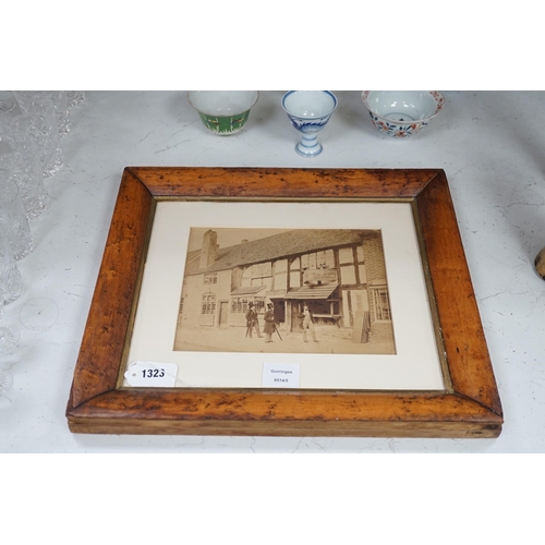 1323 - A framed 19th century photograph of Shakespeares home, together with its provenance letter. Frame o... 