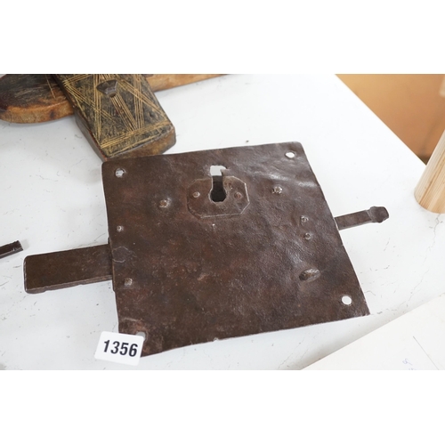 1356 - Three early ironwork lock plates with keys and a carved hardwood bolting lock