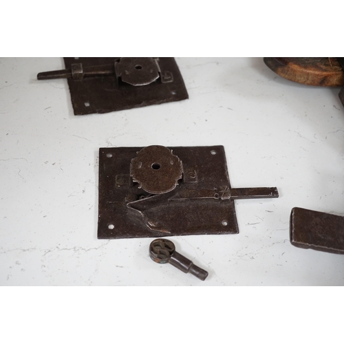 1356 - Three early ironwork lock plates with keys and a carved hardwood bolting lock