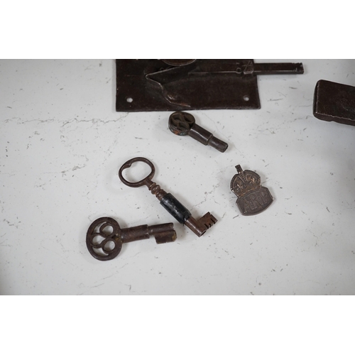 1356 - Three early ironwork lock plates with keys and a carved hardwood bolting lock