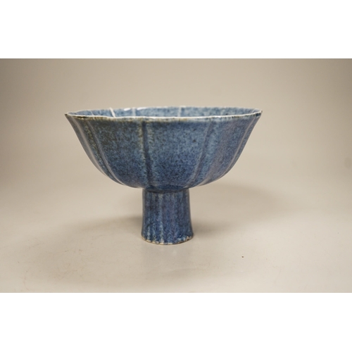 1358 - A Chinese powder blue glazed stem cup, 11cm tall