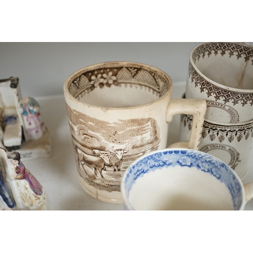 1365 - A collection of German porcelain Fairings, including Possneck, and four printed creamware mugs and a... 