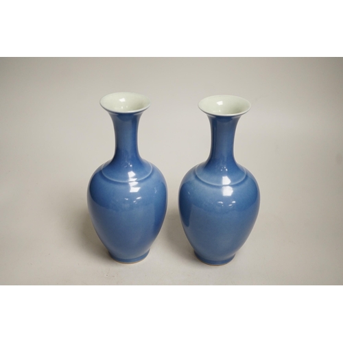 1391 - A pair of Chinese blue glazed vases, 21cm