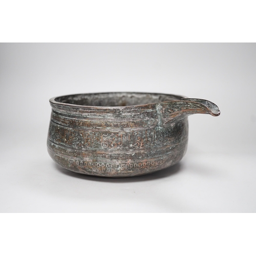 1393 - An early Islamic tinned copper pouring vessel, Egypt or Syria, 26cm long, Kufic inscriptions