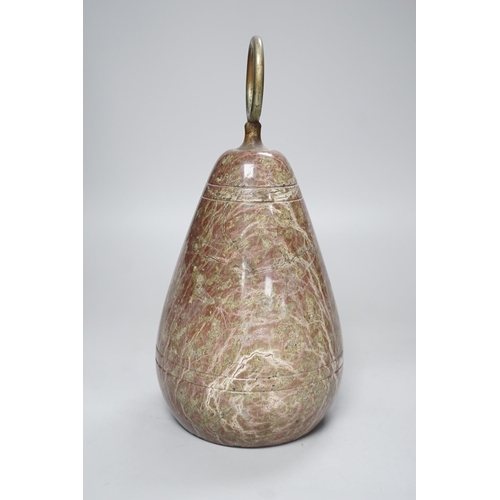 1395 - A polished serpentine doorstop. 21cm tall