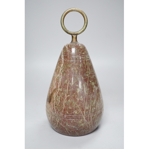 1395 - A polished serpentine doorstop. 21cm tall