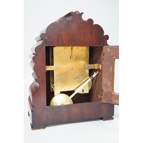 1397 - Mason, Ipswich. A 19th century mahogany cased mantel clock with scrolling moulded decoration - 31cm ... 