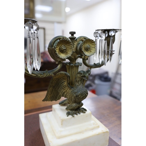 1515 - A pair of 19th century eagle two branch candelabra,34cms high x 3cms wide