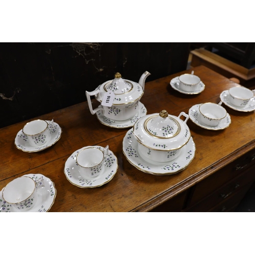 1516 - A 19th century Paris porcelain 'Chantilly Flowers' part tea and coffee set