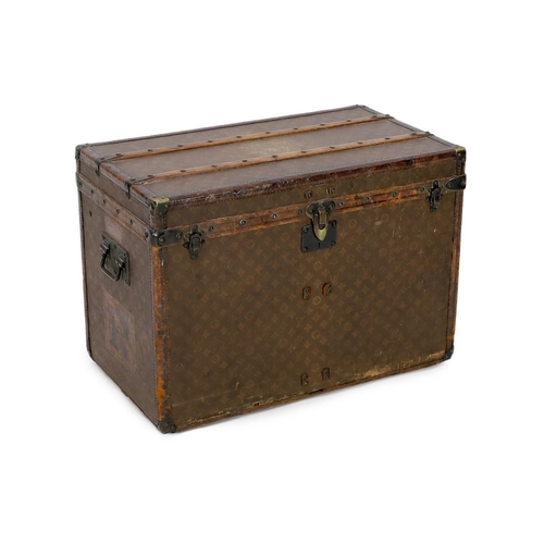 44 - A Louis Vuitton brass mounted leather bound trunk, c.1910, numbered 137426, with LV covering and too... 