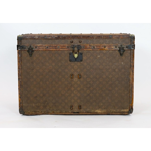 44 - A Louis Vuitton brass mounted leather bound trunk, c.1910, numbered 137426, with LV covering and too... 