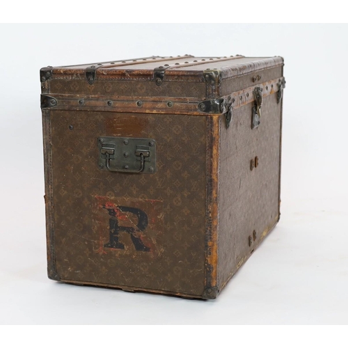 44 - A Louis Vuitton brass mounted leather bound trunk, c.1910, numbered 137426, with LV covering and too... 